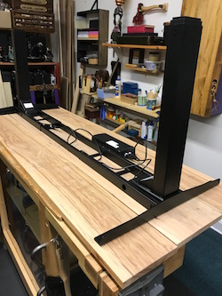 Dry-assembled base and motor control for standing desk before glue up of the three boards