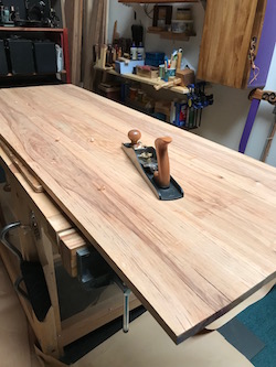 Planing the edge-glued panels of pecan