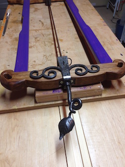 Purple frame saw with forged scroll hardware