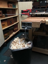 Fluffy wood shavings in the bin.