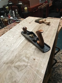 Flattening glued up panels for desk top with the assistance of the low angle jack plane