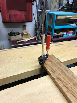 Clamping a board on the bench through the "gap"