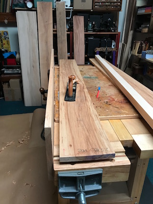 Pecan boards fresh from the lumber yard on the wood bench