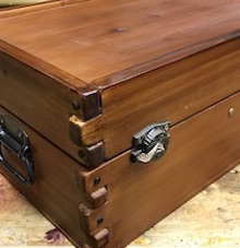 Keeping it green: tool box with ebony plugs covering screw holes
