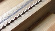 Closeup of the sharpened frame saw blade