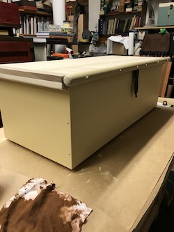 Chest after application of finishing first coat of water-based paint.