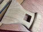 Veneer hammer head with a mortise for the handle.