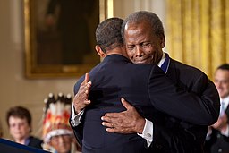 Sidney Poitier embracing President Barack Obama after getting Medal of Freedom