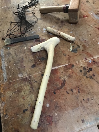 Ready for lashing; the debarked and cleaned up handle with blade, seine twine, mallet, and small piece cut from original handle.