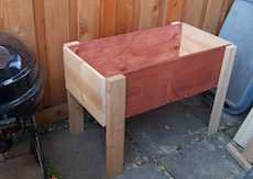 The garden planter, made form scrap wood, before staining.
