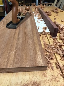 Planing and prepping of mahogany boards for altar project.
