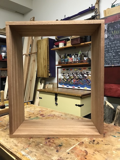 Altar healing cabinet put together on top of the workbench.