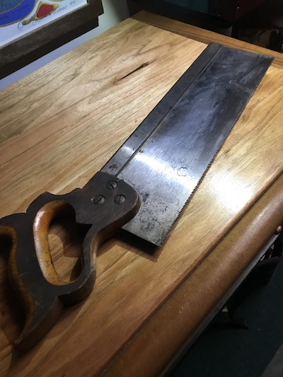 Old Atkins Sheffield backsaw before restoration of the metal blade and wood handle.