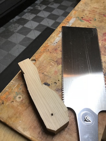 Shaping an ash wood handle blank with a Japanese saw.