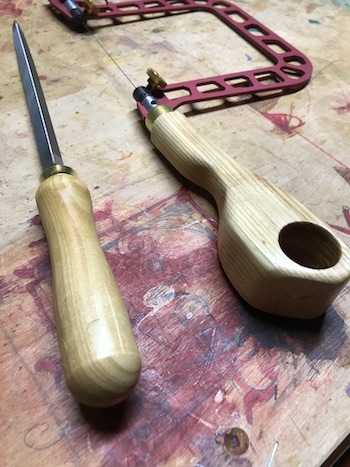 Fret saw fitted with a new handle and a large saw file fitted in the old fret saw handle.