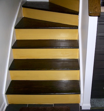 The finished stairway with renovated treads and risers.