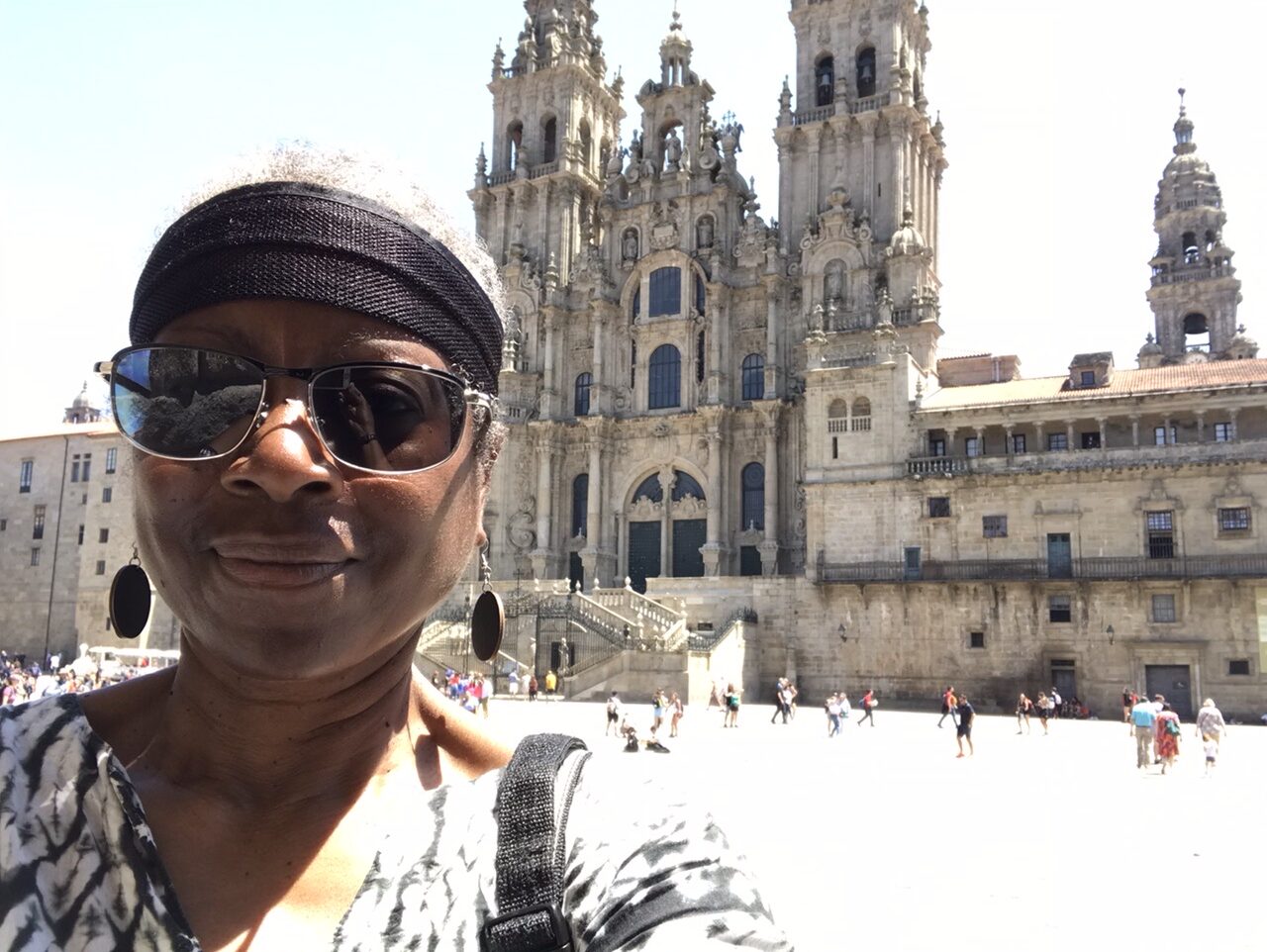 A woman at the square in front of the cathedral in Santiago.