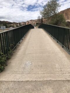 A bridge leading into a town needs no signs or markers.