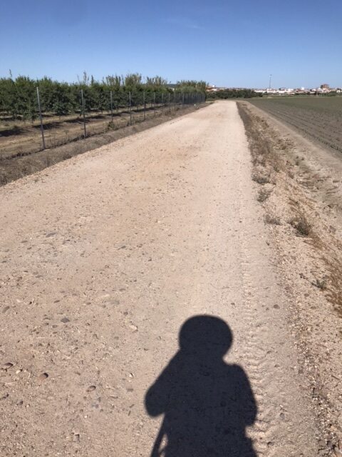 Pilgrm on the camino de Santiago leaving the town of Merida.