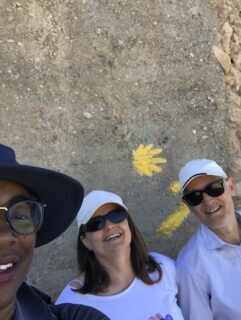 A local couple from Almeria in front of the yellow camino signs.