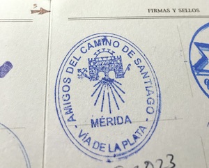 A pilgrim credential stamp from the albergue in Merida.