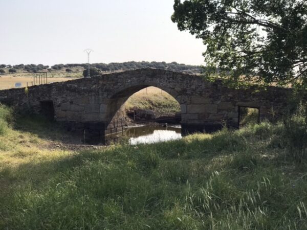 An old stone bridge on the camino trail.
