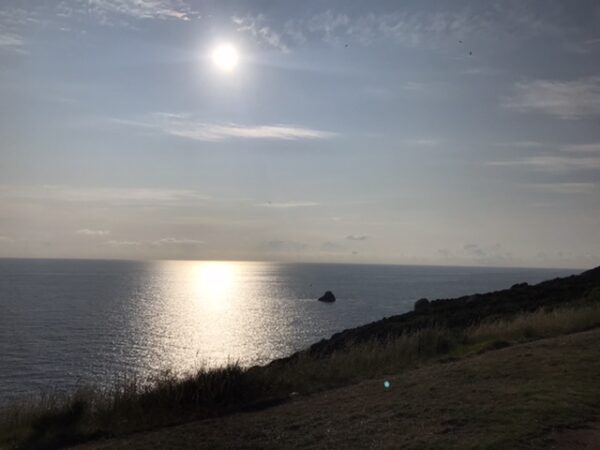 The sun over the Atlantic Ocean at Fisterra, Spain.