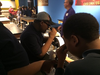 Black students learn about science at the museum.