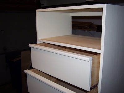 Another view of cabinet wall chest in garage workspace.