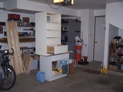 Wall chest on top of a makeshift workbench.