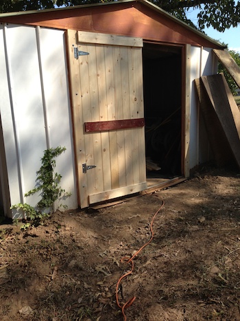 A door attached to the shed.