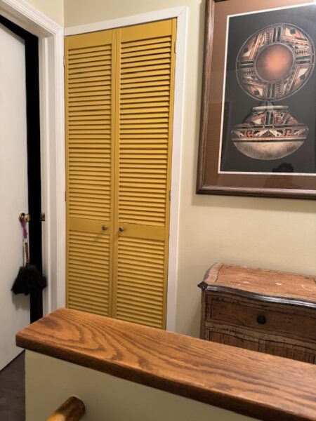 Laundry closet louvered door.